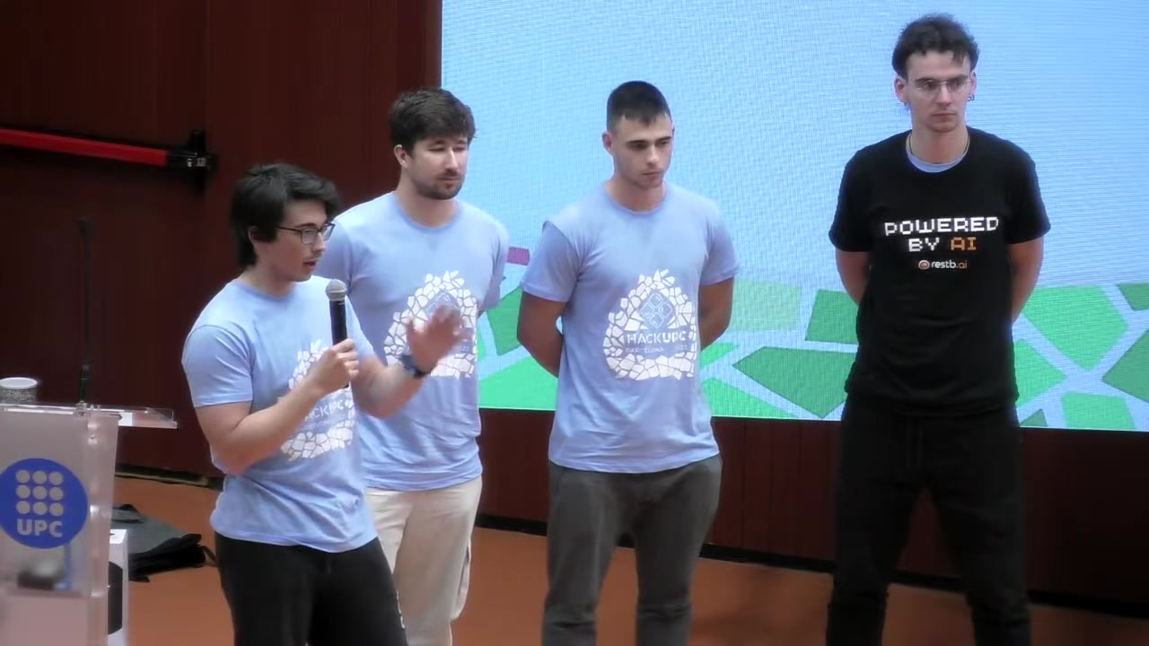 The team on stage at the HackUPC 2023 finals
